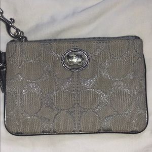 Silver COACH wristlet